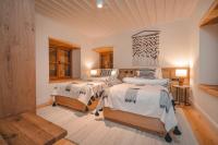 Postel nebo postele na pokoji v ubytování 6 ROOMS BY AZUMARE