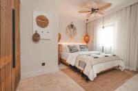 Postel nebo postele na pokoji v ubytování 6 ROOMS BY AZUMARE