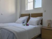 Posteľ alebo postele v izbe v ubytovaní Verga Villas Resort