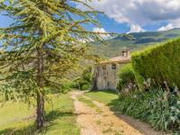 a path leading to a house in a garden at Holiday Home Le Cèdre - RSB100 by Interhome in Roche-Saint-Secret