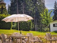 Vonkajšia záhrada v ubytovaní Das Alpin - Hotel Garni Guesthouse