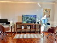 TV a/nebo společenská místnost v ubytování Home2Book El Encanto La Laguna Centro Histórico