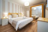 Postel nebo postele na pokoji v ubytování Begoña Apartamento