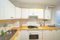 Kuchyň nebo kuchyňský kout v ubytování Begoña Apartamento