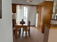 Kuchyň nebo kuchyňský kout v ubytování fotini's apartment