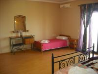 A bed or beds in a room at Zante View Studios & Villas