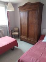 Cama ou camas em um quarto em La maison d&#39;Ormancey