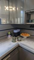 a kitchen counter top with a plate of food on it at Villa Khaki 