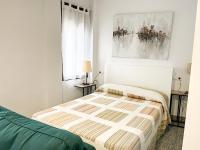 Posteľ alebo postele v izbe v ubytovaní Apartamentos Villa Torcal