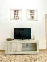 A television and/or entertainment centre at Casa Repasi