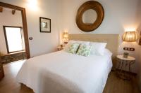 A bed or beds in a room at Miraverde Liérganes