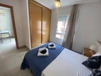 Posteľ alebo postele v izbe v ubytovaní Homely Apartments Las Salinas