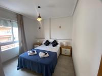 Posteľ alebo postele v izbe v ubytovaní Homely Apartments Las Salinas