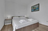 Posteľ alebo postele v izbe v ubytovaní View Blue Apartments