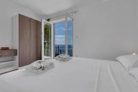 Posteľ alebo postele v izbe v ubytovaní View Blue Apartments