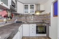 Kuchyň nebo kuchyňský kout v ubytování Holiday house SVJETLANA