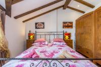 Postel nebo postele na pokoji v ubytování Holiday house SVJETLANA