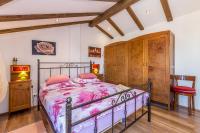 Postel nebo postele na pokoji v ubytování Holiday house SVJETLANA