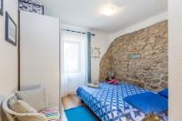 Postel nebo postele na pokoji v ubytování Holiday house SVJETLANA