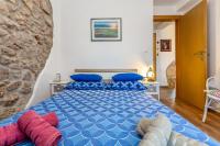 Postel nebo postele na pokoji v ubytování Holiday house SVJETLANA