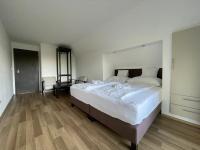 Posteľ alebo postele v izbe v ubytovaní VÁRLAK VENDÉGHÁZ Apartman 2