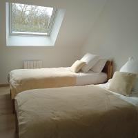 Posteľ alebo postele v izbe v ubytovaní Gîte cosy en forêt