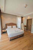 Postel nebo postele na pokoji v ubytování New Balturk Villas Sapanca