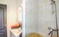 a bathroom with a shower and a sink at Amazing Home In Grospierres With Outdoor Swimming Pool, Wifi And 2 Bedrooms in Grospierres