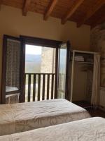 Postel nebo postele na pokoji v ubytování Apartamentos Rurales Casa Lafuente