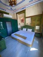 A bed or beds in a room at HANEHAN