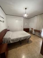 Posteľ alebo postele v izbe v ubytovaní Costa Daurada Apartaments - APARTAMENTO ARAGON