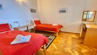 Posteľ alebo postele v izbe v ubytovaní Nautilus-Bay Holiday home with 5 rooms, on the beach, for 2-9 persons