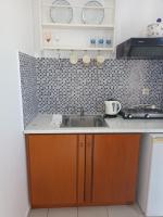 a kitchen with a sink and a counter top at Theofanis Studios in Agia Anna Naxos