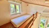 Posteľ alebo postele v izbe v ubytovaní Nautilus-Bay Holiday home with 5 rooms, on the beach, for 2-9 persons