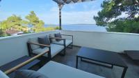 Balkón alebo terasa v ubytovaní Nautilus-Bay Holiday home with 5 rooms, on the beach, for 2-9 persons