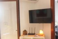 Televízia a/alebo spoločenská miestnosť v ubytovaní Casa Indalina apartamento con parking privado incluido