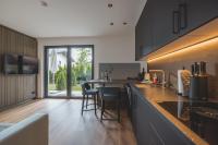 Kuchyň nebo kuchyňský kout v ubytování Thalhof Apartments
