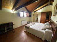 Postel nebo postele na pokoji v ubytování Hotel rural Monasterio de Ara Mada