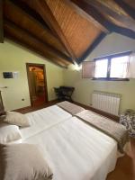 Postel nebo postele na pokoji v ubytování Hotel rural Monasterio de Ara Mada