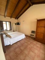 Postel nebo postele na pokoji v ubytování Hotel rural Monasterio de Ara Mada