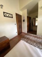 Postel nebo postele na pokoji v ubytování Hotel rural Monasterio de Ara Mada