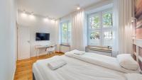 Łóżko lub łóżka w pokoju w obiekcie Apartamenty Sun & Snow Old Town Gdańsk