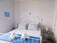 Thalassa Apartments & Studiosにあるベッド