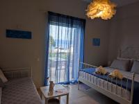 Thalassa Apartments & Studiosにあるベッド
