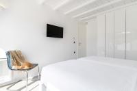 A television and/or entertainment centre at NEW - Villa Aperanto - MG Villas Mykonos