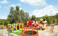a childrens playground with a water park with a water slide at Amazing Home In Grospierres With Outdoor Swimming Pool, Wifi And 2 Bedrooms in Grospierres