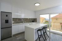 Kuchyň nebo kuchyňský kout v ubytování Apartments Marina
