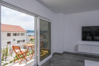TV a/nebo společenská místnost v ubytování Apartments Marina