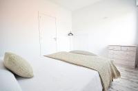 A bed or beds in a room at Casa con piscina en zona rural