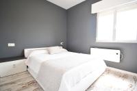 A bed or beds in a room at Casa con piscina en zona rural